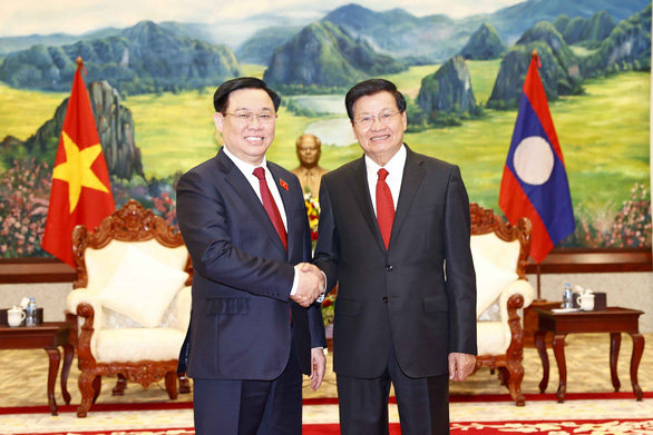 Chủ tịch Quốc hội Vương Đình Huệ gặp Tổng bí thư, Chủ tịch nước Lào - Ảnh 1.