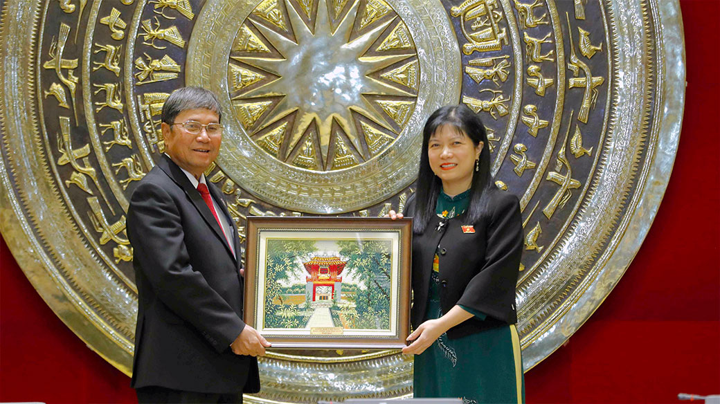 Chia sẻ kinh nghiệm về tổ chức, hoạt động của Quốc hội và HĐND Việt Nam - Lào -0