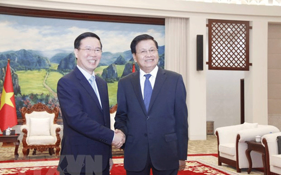 Tổng bí thư, Chủ tịch nước Lào Thongloun Sisoulith tiếp ông Võ Văn Thưởng khi ông trên cương vị Thường trực Ban Bí thư hồi tháng 7/2022 - Ảnh: TTXVN