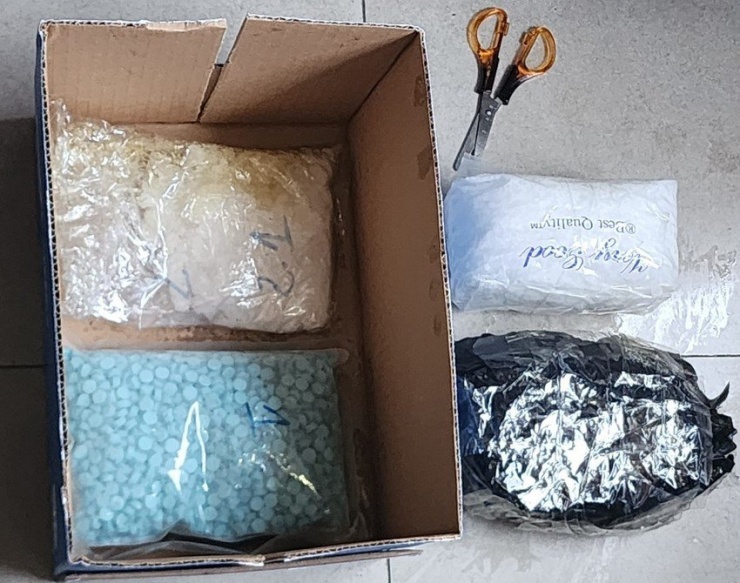 Phát hiện lô ma túy được xe khách vận chuyển từ Lào về Việt Nam - 2